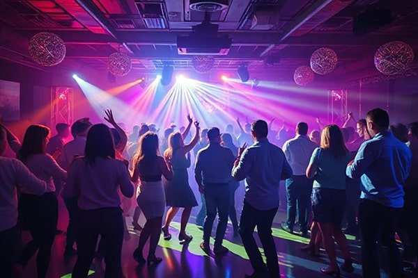 Corporate disco with lots of guests dancing
