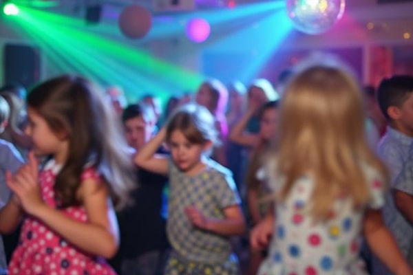 Children at school disco dancing